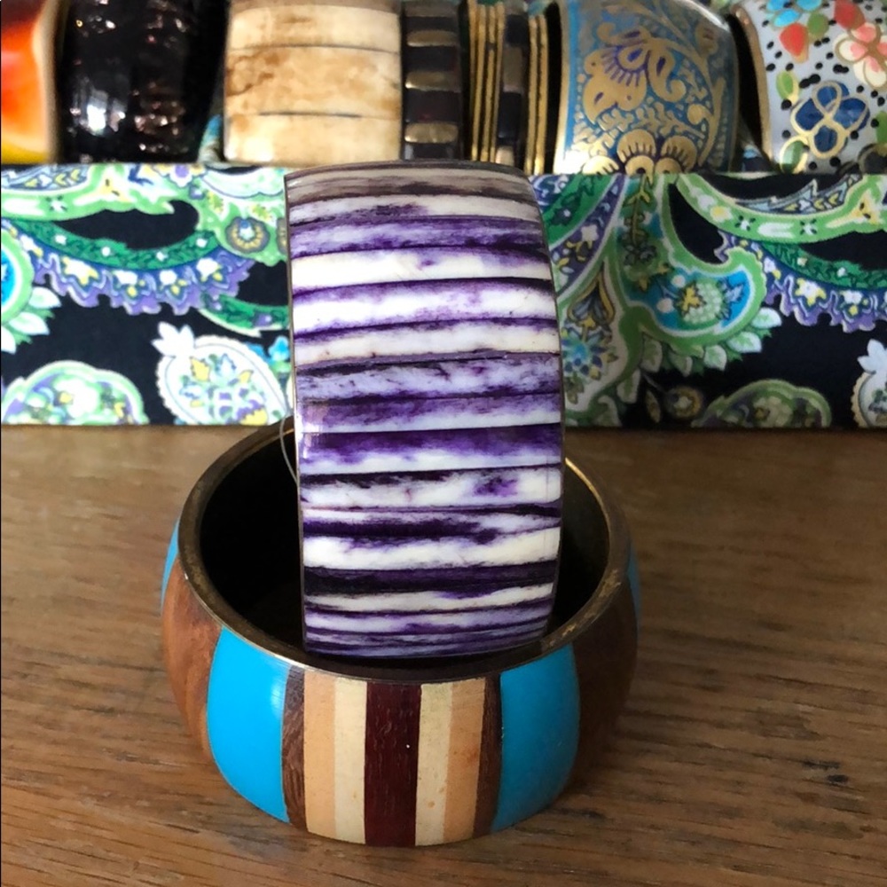 Bronze bracelet , painted wood.